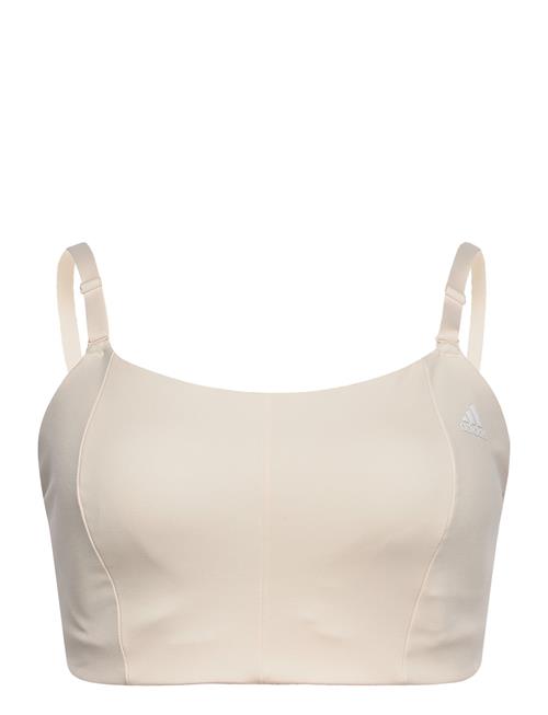 Se adidas Performance Yoga Studio Light Support Bra Plus Adidas Performance Cream ved Booztlet