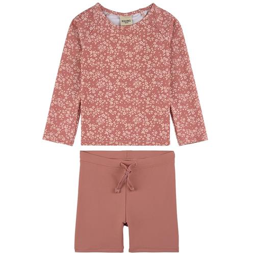 Se Kuling Rhodes Mønstret UV-sæt Desert Pink Flower | Lyserød | 98/104 cm ved Babyshop