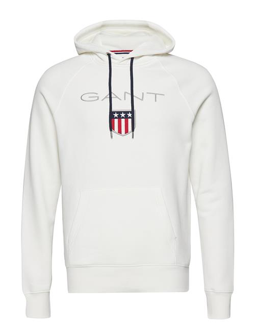 Se GANT Shield Hoodie GANT White ved Booztlet