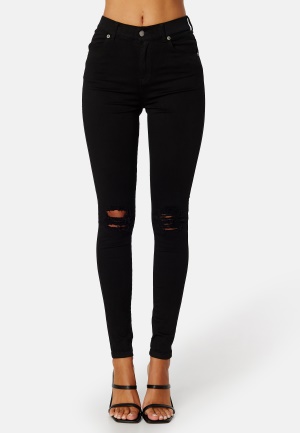 Se Dr. Denim Lexy Black Ripped Knees L ved Bubbleroom