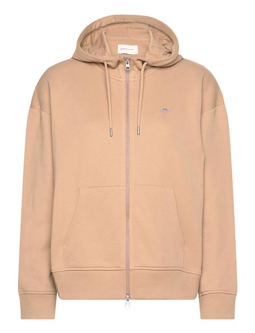 Se GANT Rel Shield Zip Hoodie GANT Beige ved Booztlet