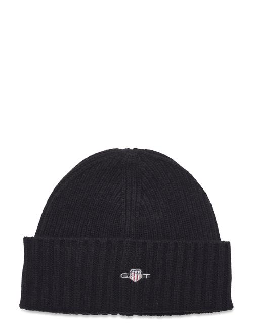 Se GANT Shield Beanie GANT Black ved Booztlet