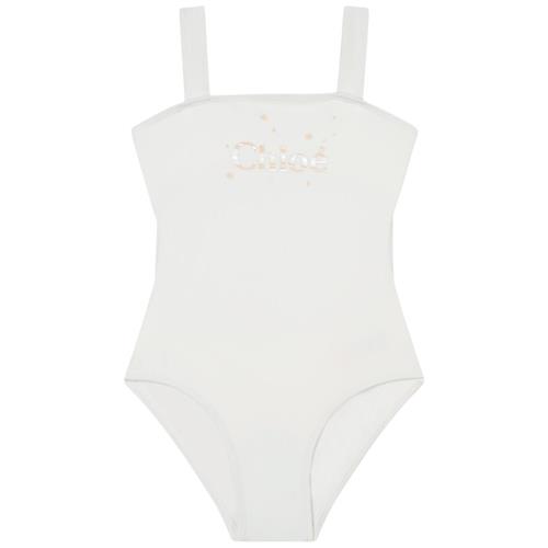 Se Chloé Logo Badedragt Naturhvid |  | 6 years ved Babyshop