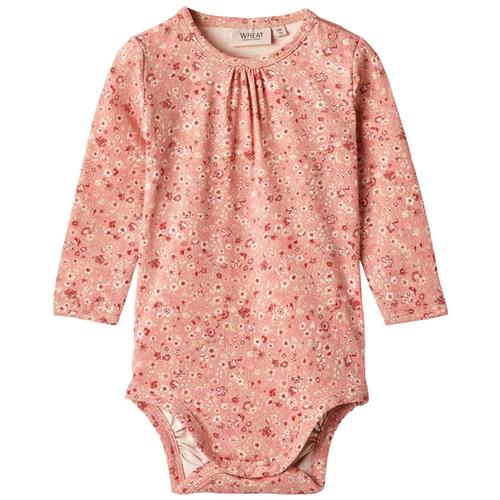 Se Wheat Liv Mønstret Babybody Rosette Flowers | Lyserød | 68 cm ved Babyshop