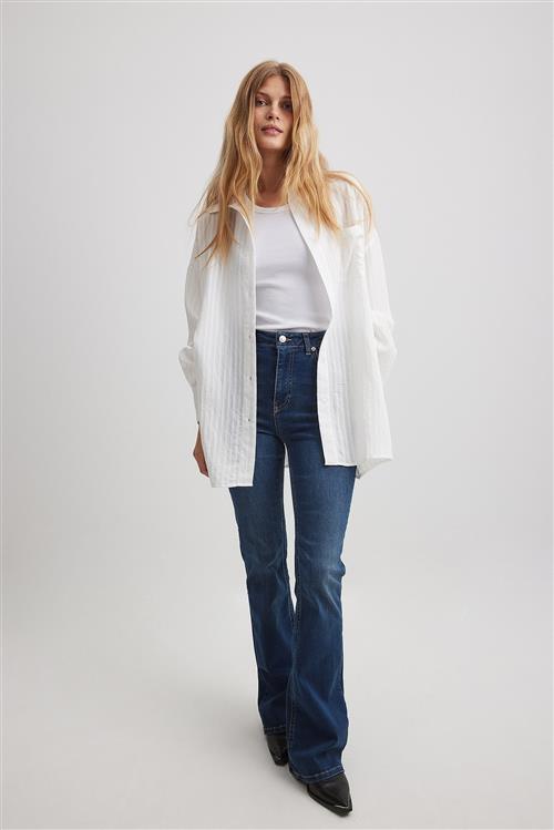 NA-KD Højtaljede løse jeans med stretch - Blue