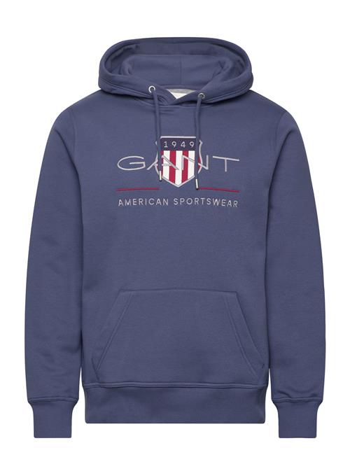 Se GANT Reg Archive Shield Hoodie GANT Blue ved Booztlet