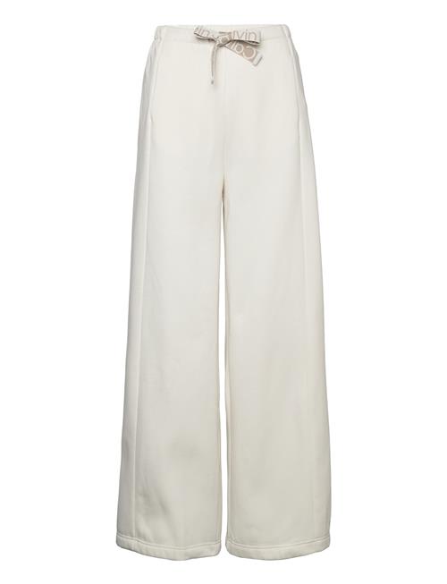 Se Calvin Klein Jeans Tape Wide Leg Jog Pant Calvin Klein Jeans Cream ved Booztlet