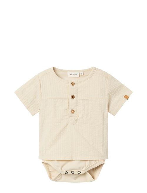 Se Lil'Atelier Nbmhoman Ss Loose Body Shirt Lil Lil'Atelier Beige ved Booztlet