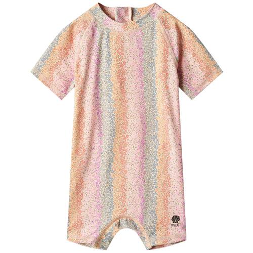 Se Wheat Cas Mønstret UV-dragt Rainbow Flowers | Lyserød | 74 cm ved Babyshop