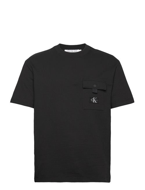 Se Calvin Klein Jeans Texture Pocket Ss Tee Calvin Klein Jeans Black ved Booztlet