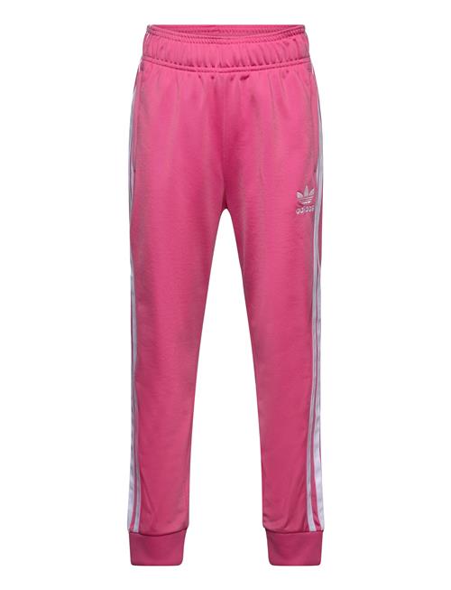 Se adidas Originals Sst Track Pants Adidas Originals Pink ved Booztlet