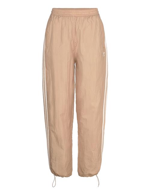 Se adidas Originals Cs Woven Pants Adidas Originals Beige ved Booztlet