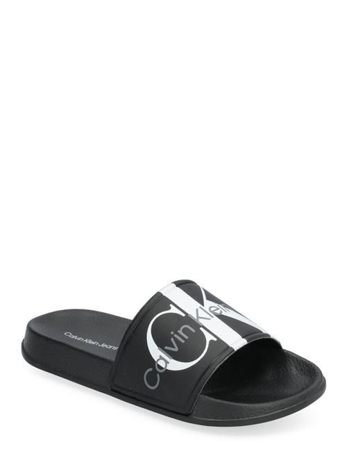 Se Calvin Klein Logo Pool Slide Calvin Klein Black ved Booztlet