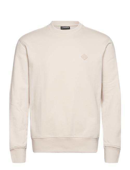 Se J. Lindeberg Thorne Crew Neck J. Lindeberg Cream ved Booztlet