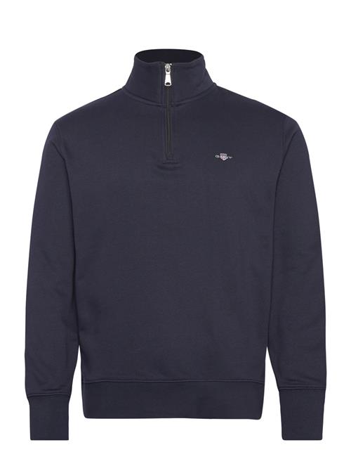 Se GANT Emb Archive Shield Half Zip GANT Navy ved Booztlet