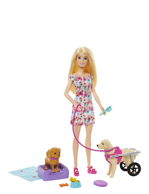 Doll With A Toy Pup And Dog In A Wheelchair, Plus Pet Accessories Barbie Patterned