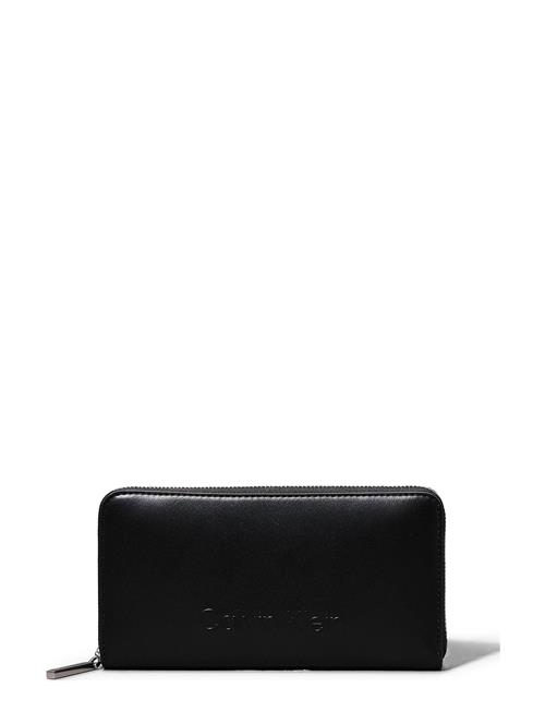 Calvin Klein Embossed Logo Zip Lg Wallet Calvin Klein Black