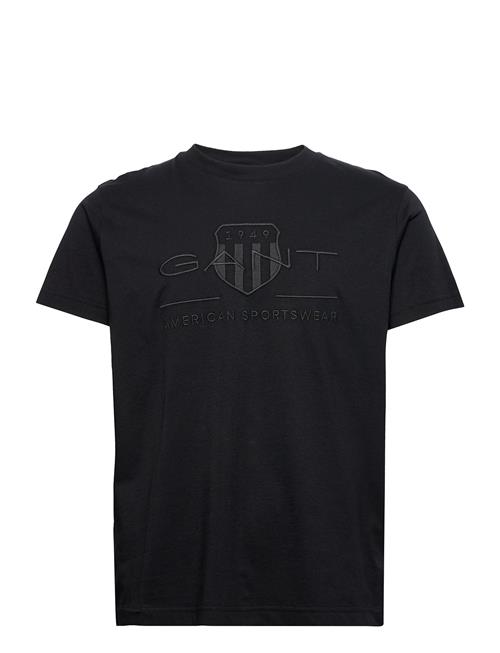 Se GANT Reg Tonal Shield Ss T-Shirt GANT Black ved Booztlet