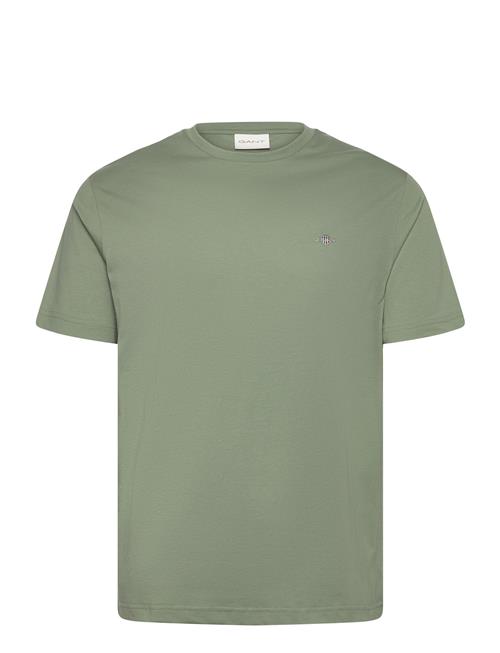 Se GANT Reg Shield Ss T-Shirt GANT Green ved Booztlet