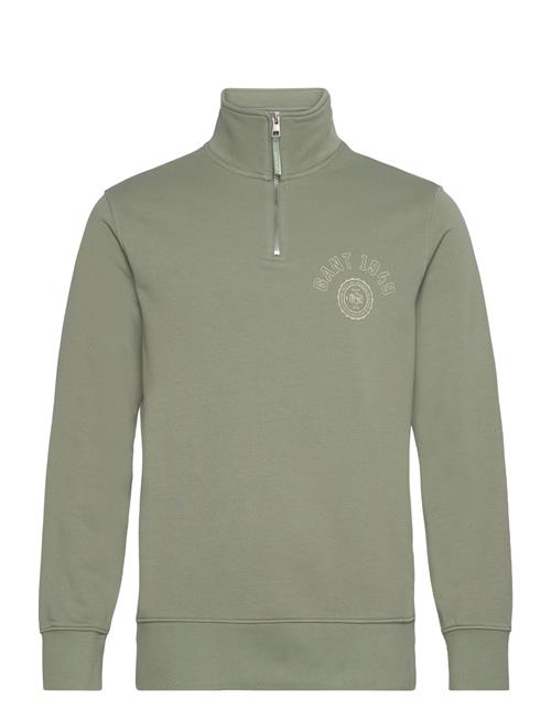 Se GANT Graphic Half Zip GANT Green ved Booztlet