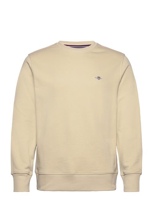 Se GANT Reg Shield C-Neck Sweat GANT Beige ved Booztlet