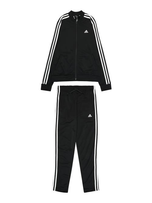 Se ADIDAS SPORTSWEAR Træningsdragt 'Essentials 3-Stripes'  sort / hvid ved About You