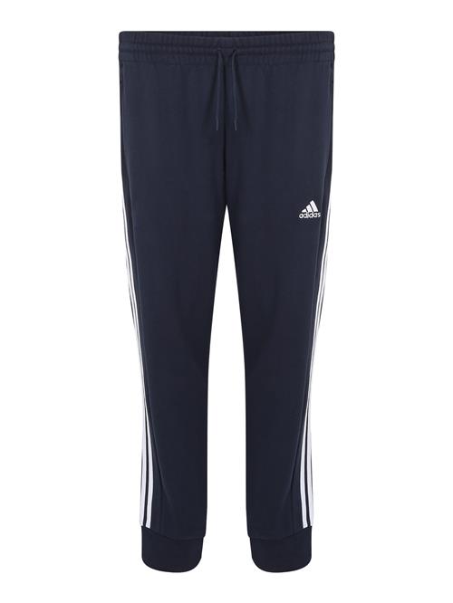 Se ADIDAS SPORTSWEAR Sportsbukser 'Essentials'  mørkeblå / hvid ved About You