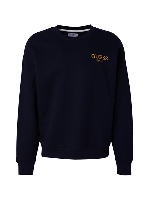 Se GUESS JEANS Sweatshirt  marin / guld ved About You