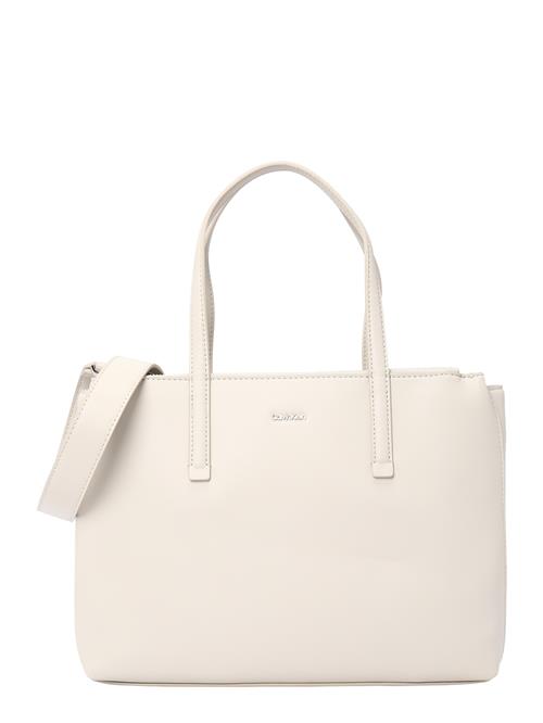 Se Calvin Klein Håndtaske 'MUST'  beige ved About You