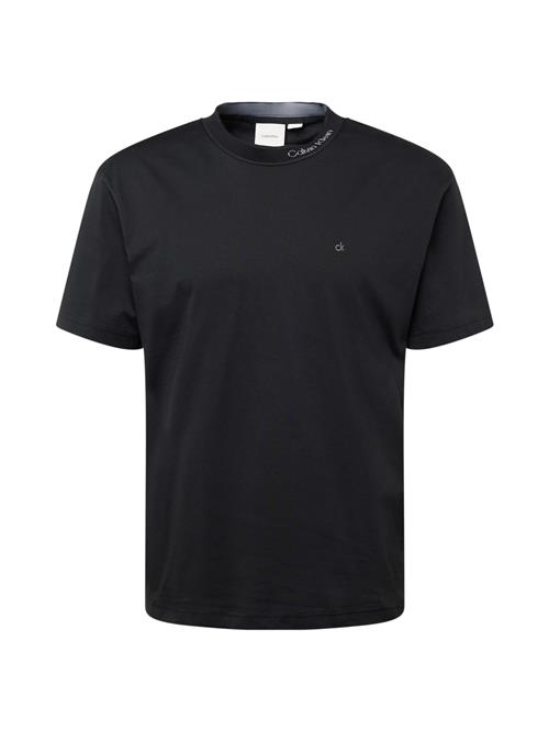 Se Calvin Klein Bluser & t-shirts  grå / sort ved About You