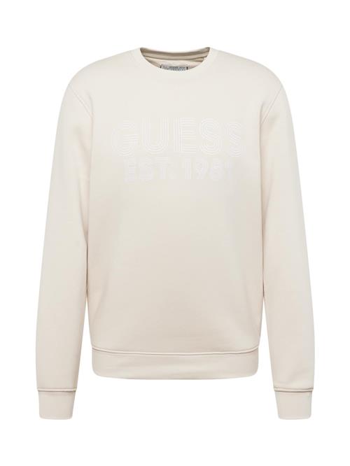 Se GUESS Sweatshirt 'BEAU'  elfenben / hvid ved About You