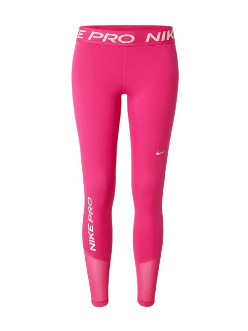 Se NIKE Sportsbukser  pink / hvid ved About You