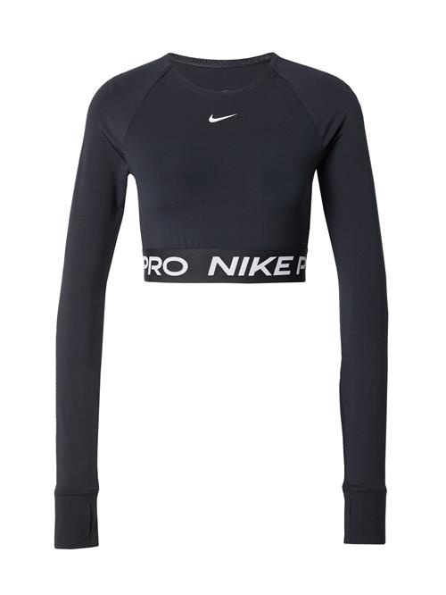 Se NIKE Funktionsbluse 'Pro'  sort / hvid ved About You