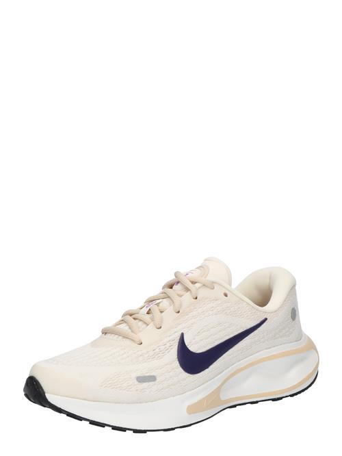 Se NIKE Løbesko 'Journey Run'  elfenben / navy ved About You