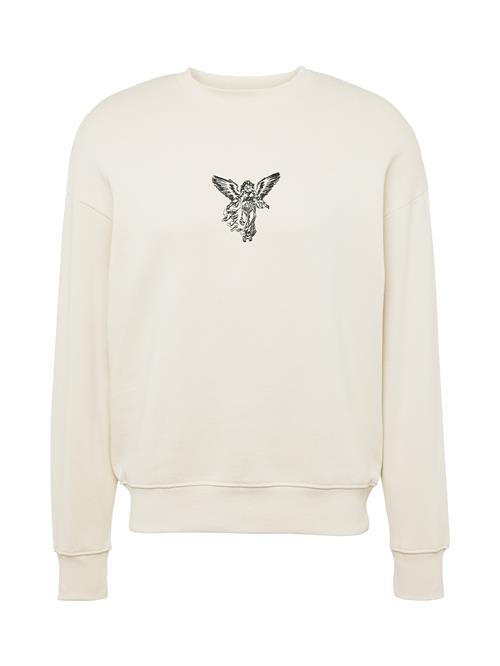 Se JACK & JONES Sweatshirt  creme / sort ved About You