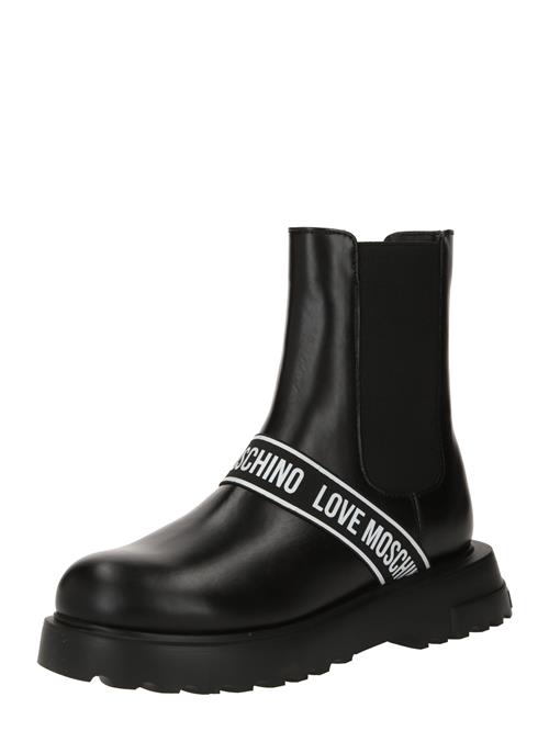 Se Love Moschino Chelsea Boots  sort / hvid ved About You