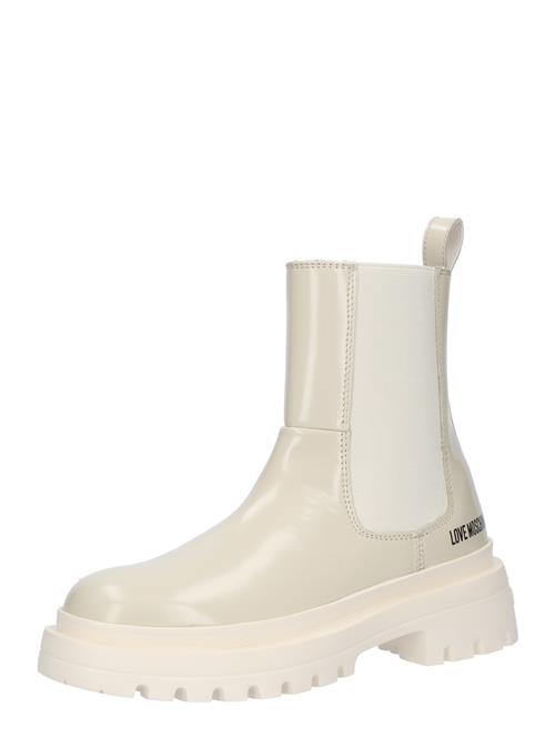 Se Love Moschino Chelsea Boots  elfenben ved About You