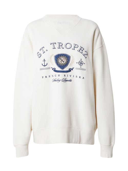 Se Abercrombie & Fitch Sweatshirt 'LUXURY DESTINATION'  beige / creme / blå / sort ved About You