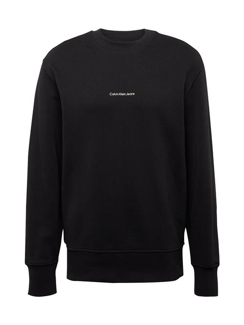 Se Calvin Klein Jeans Sweatshirt 'CITY GRID MAP'  sort / hvid ved About You