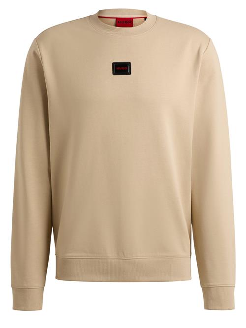 Se HUGO Sweatshirt 'Diragol'  beige / rød / sort ved About You