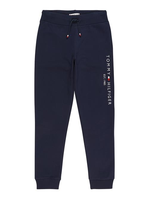 Se TOMMY HILFIGER Bukser  navy / rød / hvid ved About You