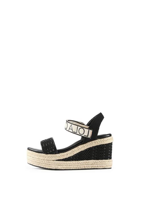 Se Lola Casademunt Sandaler  beige / sort ved About You