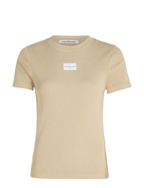 Se Calvin Klein Jeans Washed Woven Label Rib Baby Tee Calvin Klein Jeans Beige ved Booztlet