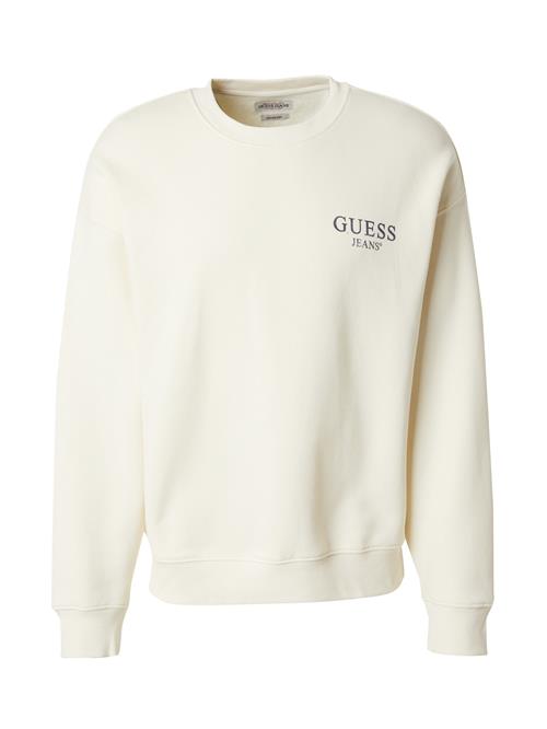 Se GUESS JEANS Sweatshirt  lysebeige / marin ved About You