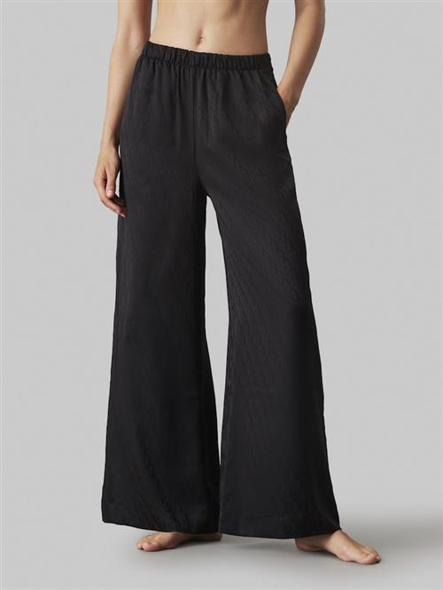 Se Calvin Klein Pant Natbukser Str L - hos Magasin ved Magasin