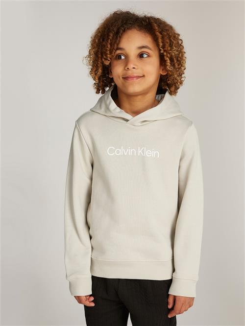 Se Calvin Klein Inst. Logo REG. Terry Hoodie Str 12 - Pelican Sweatshirts hos Magasin ved Magasin