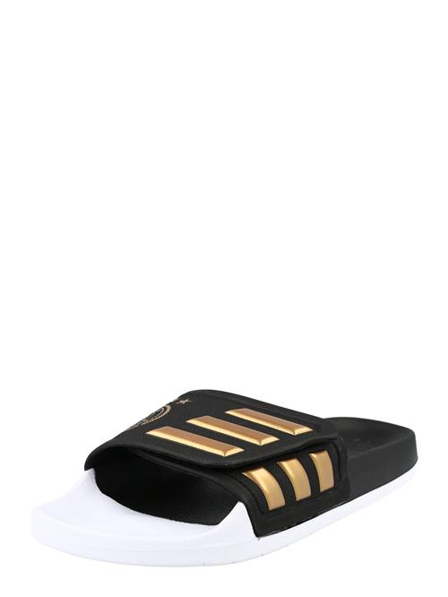 Se ADIDAS SPORTSWEAR Strand-/badesko 'TND Adilette'  guld / sort ved About You