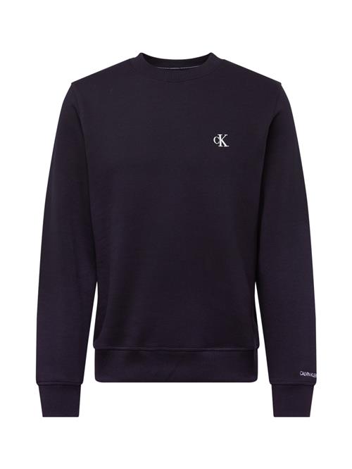 Se Calvin Klein Jeans Sweatshirt 'Essential'  sort / hvid ved About You