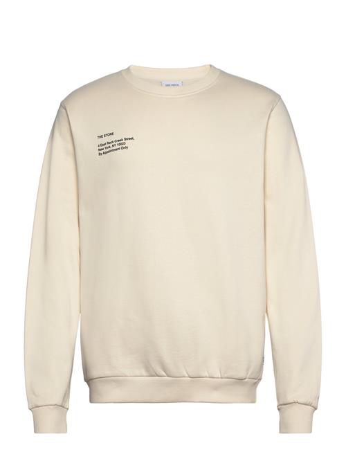 Se Les Deux Neighborhood Sweatshirt Les Deux Cream ved Booztlet