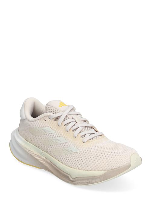 Se adidas Performance Supernova Stride W Adidas Performance Beige ved Booztlet